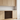 Wooden wine rack embedded in a kitchen cabinet with light wood finish.