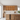 Modern kitchen with wooden cabinets and a wine rack.