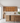 Modern kitchen with wooden cabinets and a wine rack.