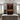 Modern kitchen with wine rack, oven, and refrigerator.