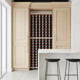Wine cellar with wooden cabinets and wine bottles in a modern kitchen setting.