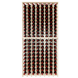 Wooden wine rack with red wine bottles on a white background