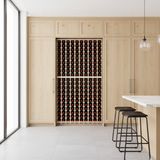 Wooden wine rack with bottles inside a modern kitchen.