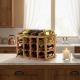 Wooden wine rack with bottles on a kitchen counter with a candle