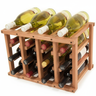 Wooden wine rack holding multiple wine bottles on a white background