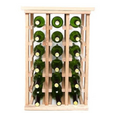 Wooden wine rack with green wine bottles on a white background