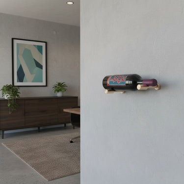 Wine bottle on a wall-mounted shelf in a modern living room.