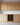 Wooden kitchen cabinets with a built-in wine rack.