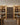 Wooden wine rack with bottles in a store setting