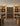 Wooden wine rack with bottles in a store setting