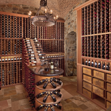 Wine cellar with wooden shelves and stone walls
