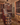 Wine cellar with wooden shelves and stone walls