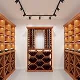Wooden wine rack system in a modern wine cellar with track lighting.