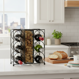 Wine rack with bottles on a kitchen counter with bread and coffee.