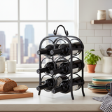 Black metal wine rack holding bottles on a kitchen counter with a cityscape view.