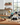 Wine rack with bottles on a kitchen counter with a window view