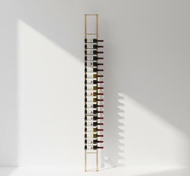 Wine rack with bottles against a white wall