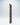 Tall wooden wine rack on a white background