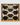 Wooden wall art with honeycomb design and black balls on a white background