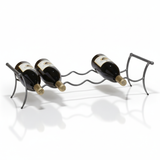 Wine rack holding three bottles on a white background