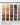 A reference chart titled 'Wood Species and Finishes' showing wood swatches for Pine, Oak, Grandis, Mahogany, and Walnut in Unfinished, Clear Coat, Castle Brown, Charcoal, and Gray finishes.