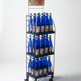 Metal display rack with blue bottles on a white background