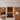 Wine cellar with wooden shelves and a reception desk.