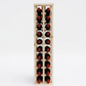 Wooden wine rack with red wine bottles on a white background