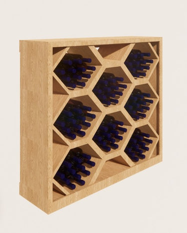 Wooden wine rack with honeycomb design holding bottles on a light beige background