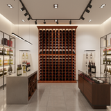 Wine cellar with wooden wine rack and shelves displaying various bottles.