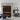 Modern interior with wine rack, dining table, and gray sofa.