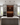 Modern kitchen with wine rack, oven, and refrigerator.