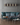 W Series Over the Couch Wine Rack Kit in Golden Bronze Black Storing 15 Bottles in a Living Room