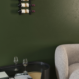 W Series 1 Foot Tall Rack in Matte Black Storing 3 Bottles in a room