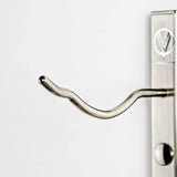 Metal door handle with lock on a white background