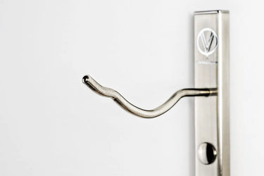 Metal door handle with lock on a white background