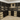 Wine cellar with shelves filled with wine bottles and wooden crates.