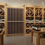 Wine cellar with wooden shelves and wine bottles in a well-lit room.