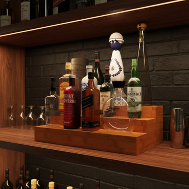 Bottles on a wooden shelf with a brick wall background