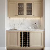 Beige kitchen cabinets with wine storage and marble countertop