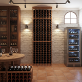 Wine cellar with wooden wine rack, table with decanter and glasses, and modern wine cooler.