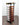 Wine rack with bottles on a wooden floor against a white wall