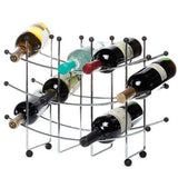 Metal wine rack holding six bottles of wine on a white background