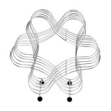 Decorative wall art with interwoven metal wires on a white background