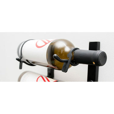 W Series bottle retention straps shown with a bottle on a wine rack 